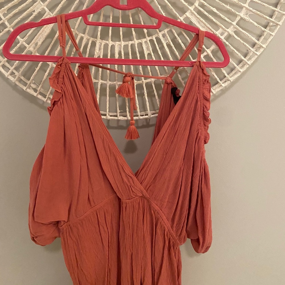 low cut burnt orange/salmon colored romper